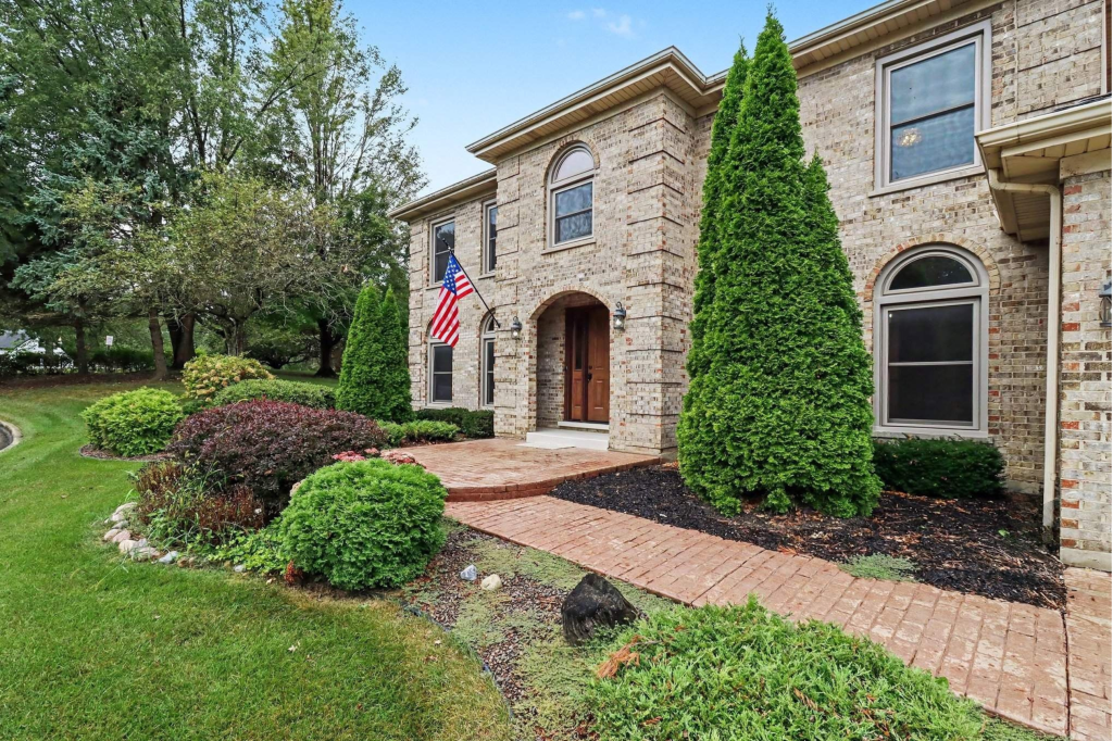 Exterior of a home representing home equity when considering options before foreclosure